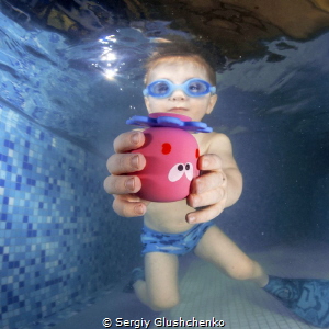 Children swimming by Sergiy Glushchenko 
